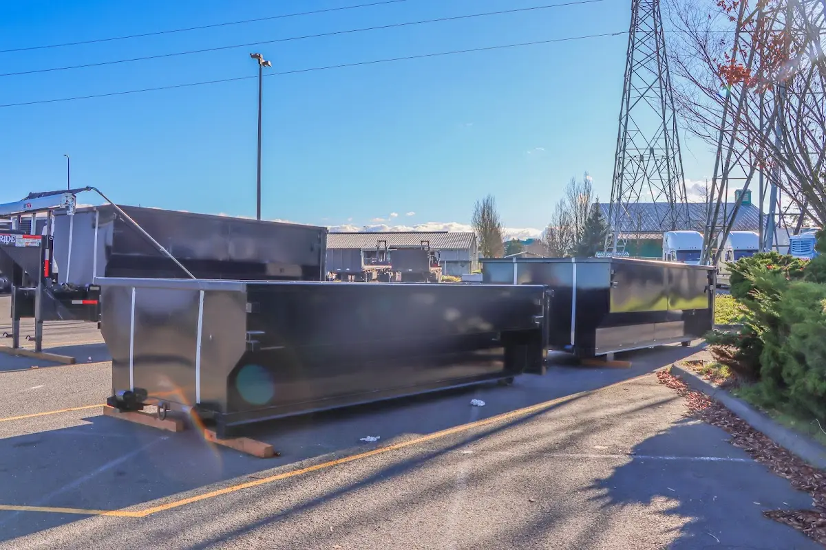 Roll-off dumpster ready for waste disposal at job site for 12 Yard Dumpster Rental in Sunset